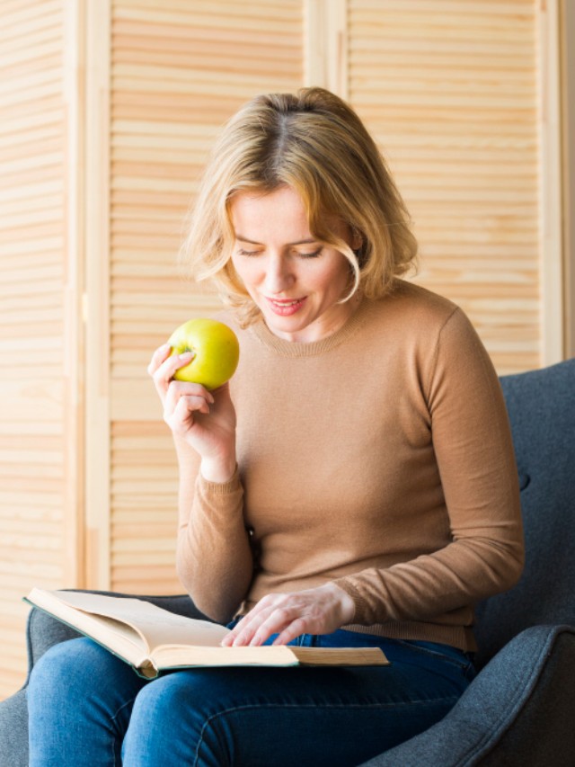 Healthy Woman Reading Best Books on Health